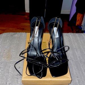 Brand new in box black tie up Steve Madden heels with a gold chain backing..9.5